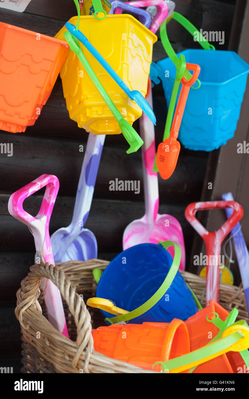 Plastic buckets and spades at seaside shop Stock Photo Alamy