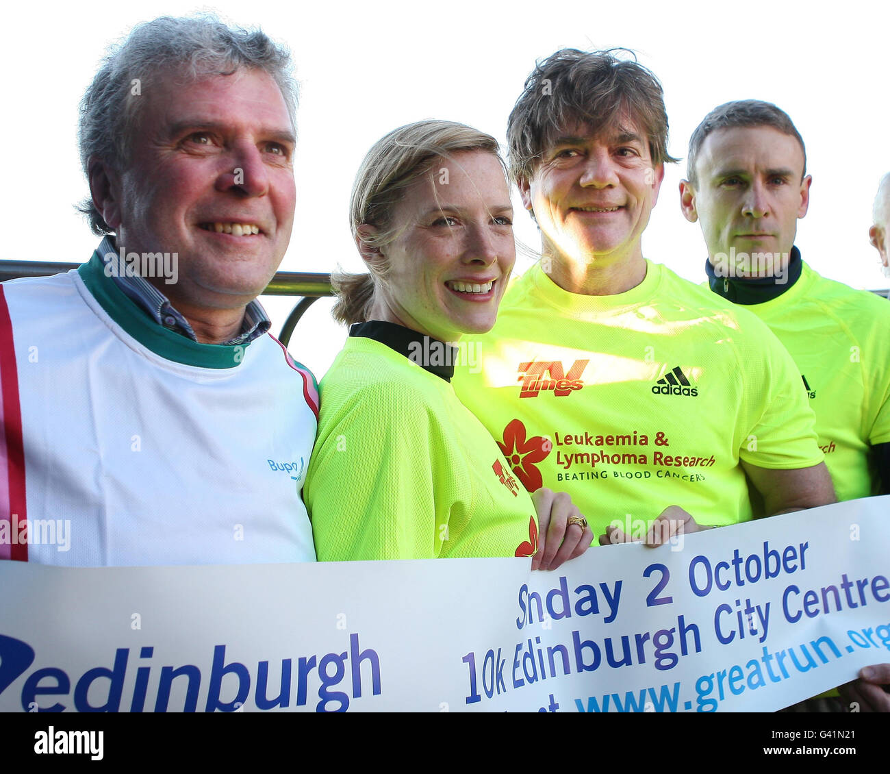 (from left) Ex footballer Peter Cormack and Scottish actors Shauna MacDonald, John Michie and Cal McAninich launch the 10K Great Edinburgh Run in Princes Street Gardens, Edinburgh, which takes place on the October 2. Stock Photo