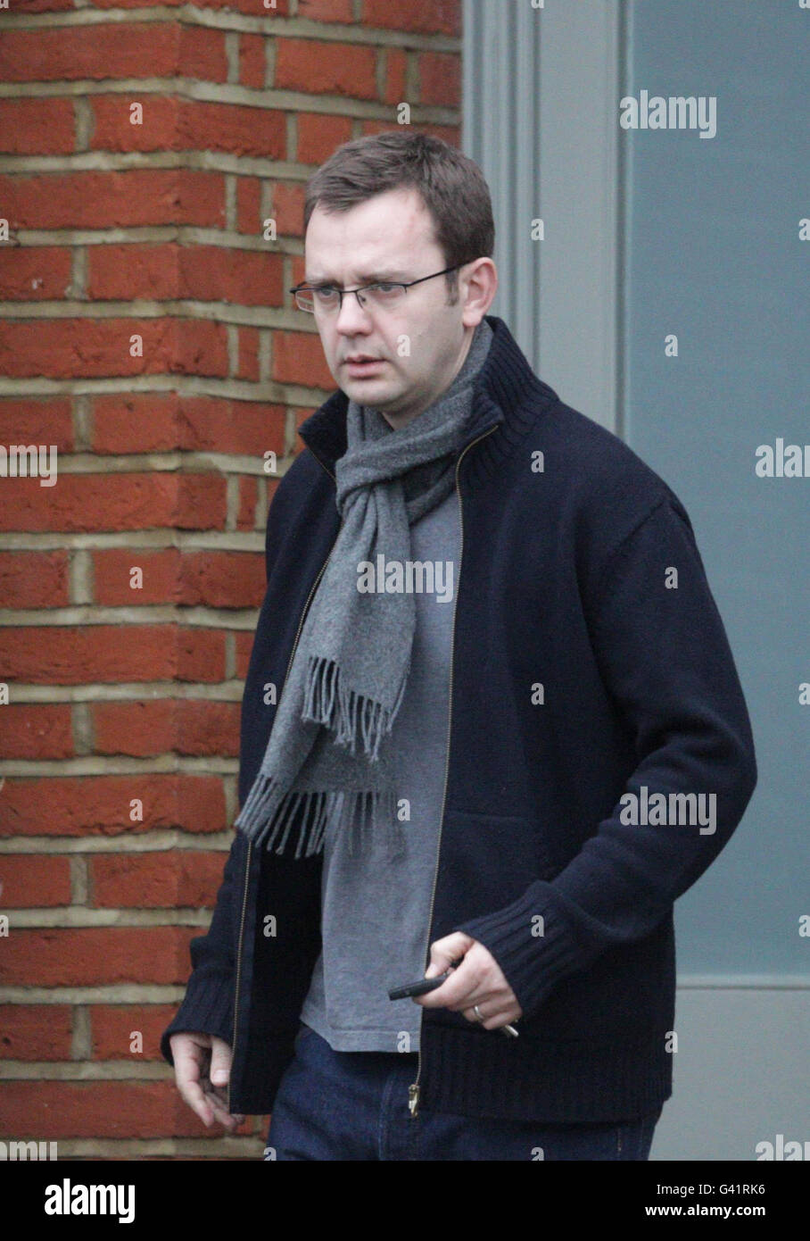 Phone hacking claims. Andy Coulson leaves his home in South London ...