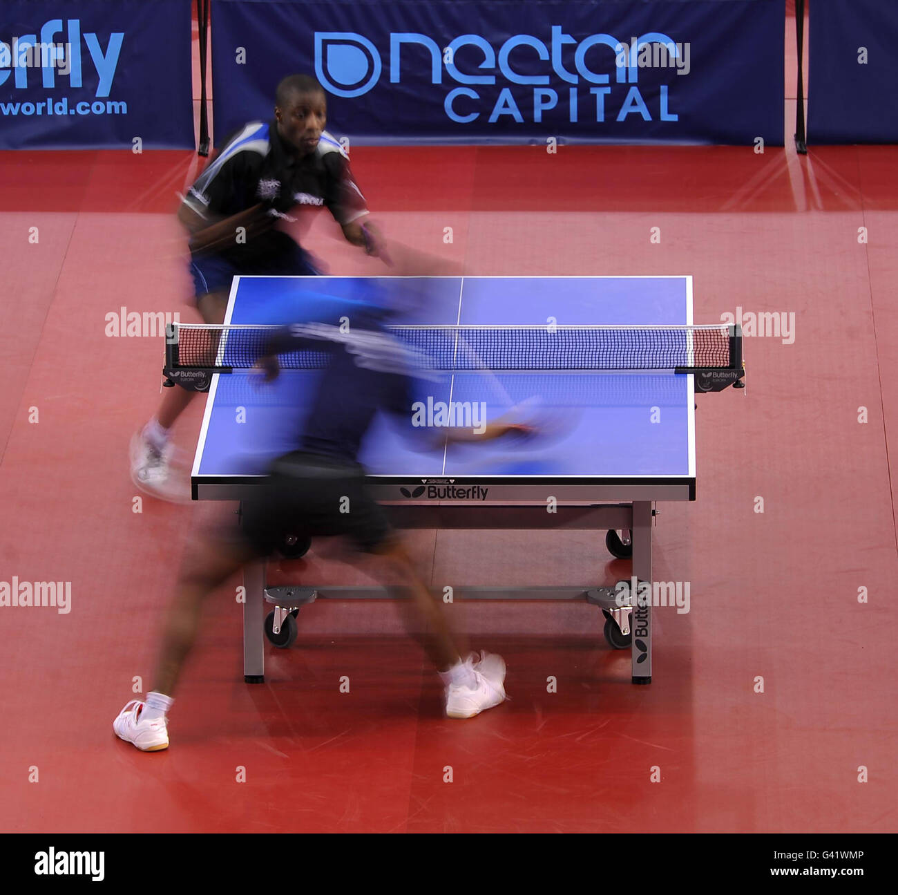 England's Darius Knight (top) in action against France's Addel-Kader  Salifou during their Men's Qualifying group match during the Pro Tour  English Open at the English Institute of Sport, Sheffield Stock Photo -