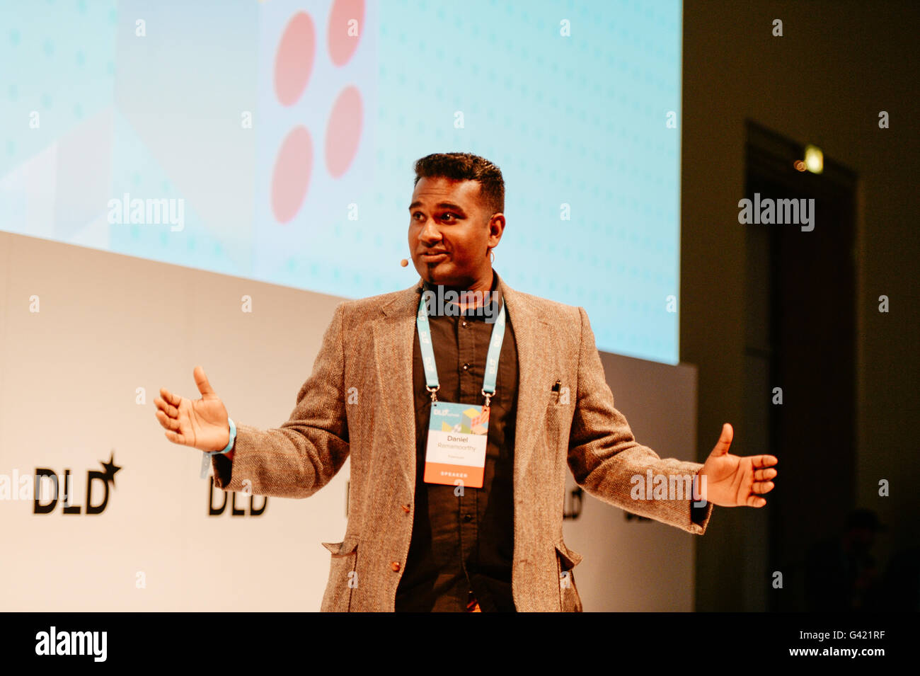 MUNICH/GERMANY - JUNE 16: Entrepreneur Daniel Ramamoorthy gestures speaking onstage during the DLDsummer Conference 2016 at Haus der Kunst, Munich. DLDsummer takes place June 16-17, 2016 and focuses on the changing through digitalization in the areas of life, work and business (Photo: picture alliance for DLD/Jan Haas) | usage worldwide Stock Photo
