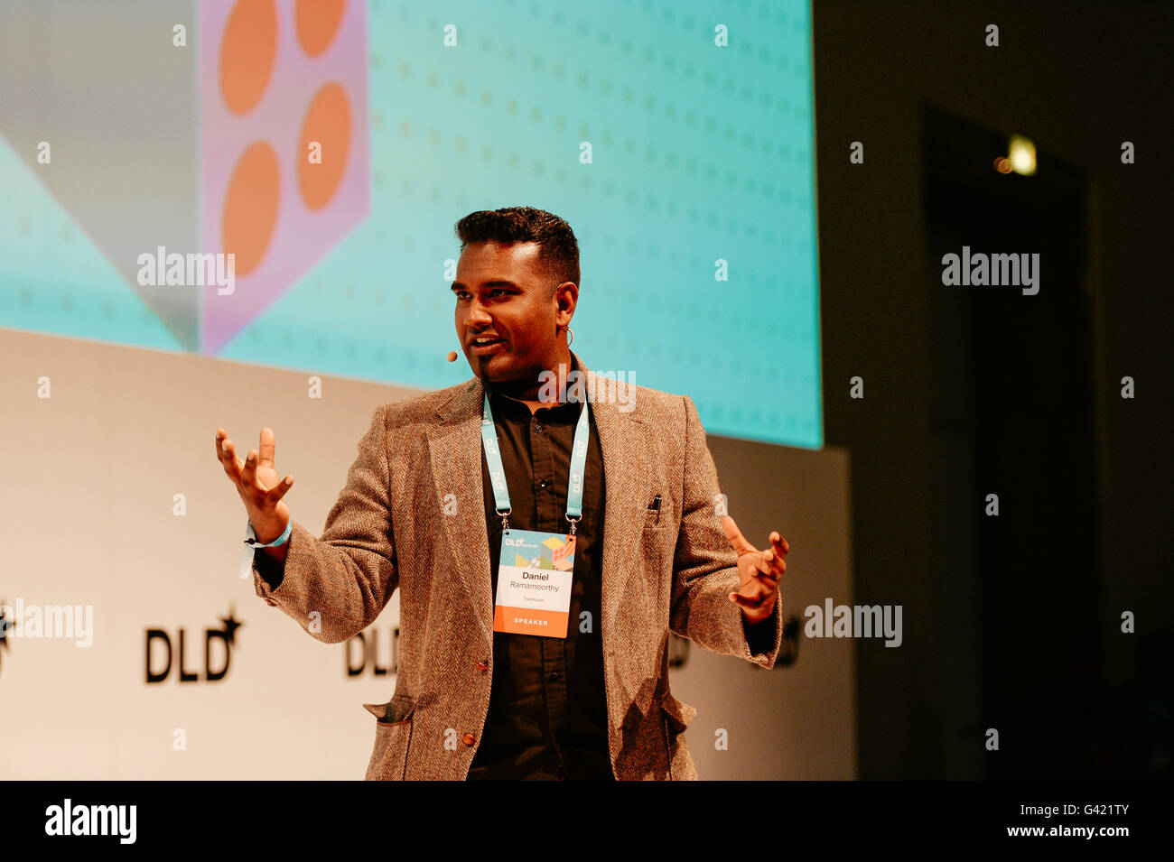 MUNICH/GERMANY - JUNE 16: Entrepreneur Daniel Ramamoorthy gestures speaking onstage during the DLDsummer Conference 2016 at Haus der Kunst, Munich. DLDsummer takes place June 16-17, 2016 and focuses on the changing through digitalization in the areas of life, work and business (Photo: picture alliance for DLD/Jan Haas) | usage worldwide Stock Photo