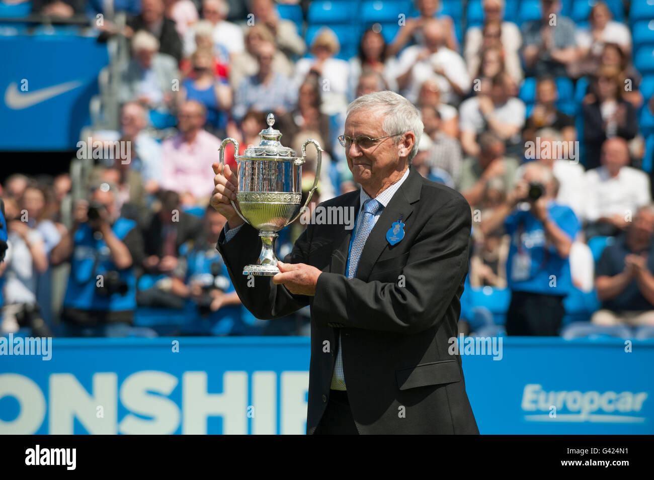 The Queen's Club, London UK. 17th June 2016. Day 5 of grass court  championships at the west London club, four-time champion Roy Emerson  presented with quarter size replica trophy. Credit: sportsimages/Alamy Live