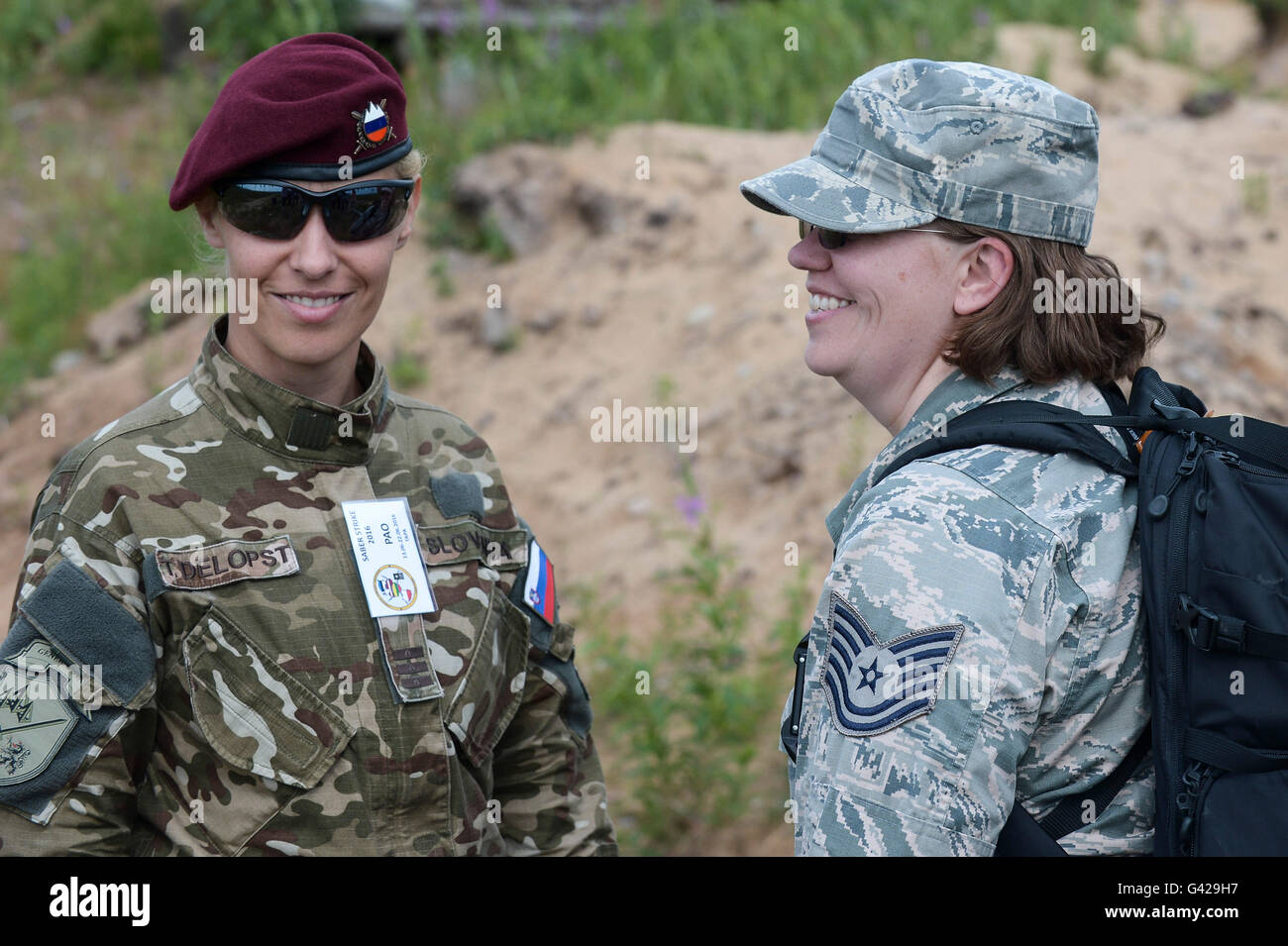 Tapa, Estonia. 17th June, 2016. Two female officers take part in Saber Strike military exercise at Central Firing Field of Estonian Defence forces in Tapa, Estonia, on June 17, 2016. Saber Strike is an annual U.S.-led exercise of land and air forces. Credit:  Sergei Stepanov/Xinhua/Alamy Live News Stock Photo