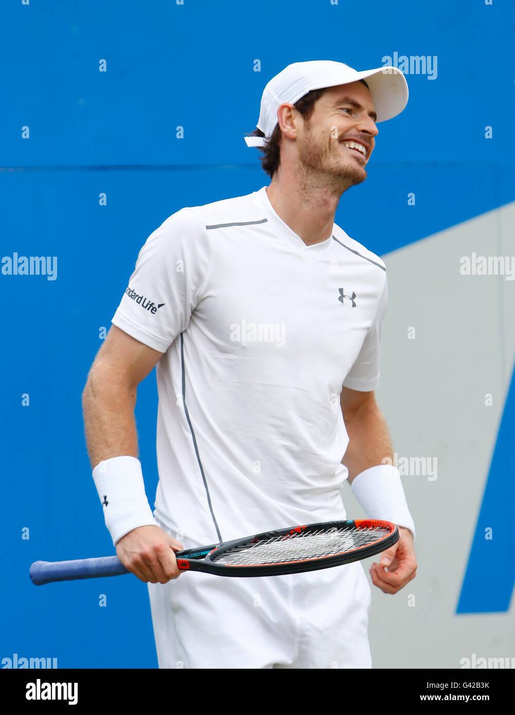 Queens Club, London, UK. 18th June, 2016. Aegon Queens Tennis Championships Day Six. Reigning champion Andy Murray (GBR) with a wry smile in his semi final match against Marin Cilic (CRO). Murray won in three sets 6-3, 4-6, 6-3, to go through to the final. Credit:  Action Plus Sports/Alamy Live News Stock Photo