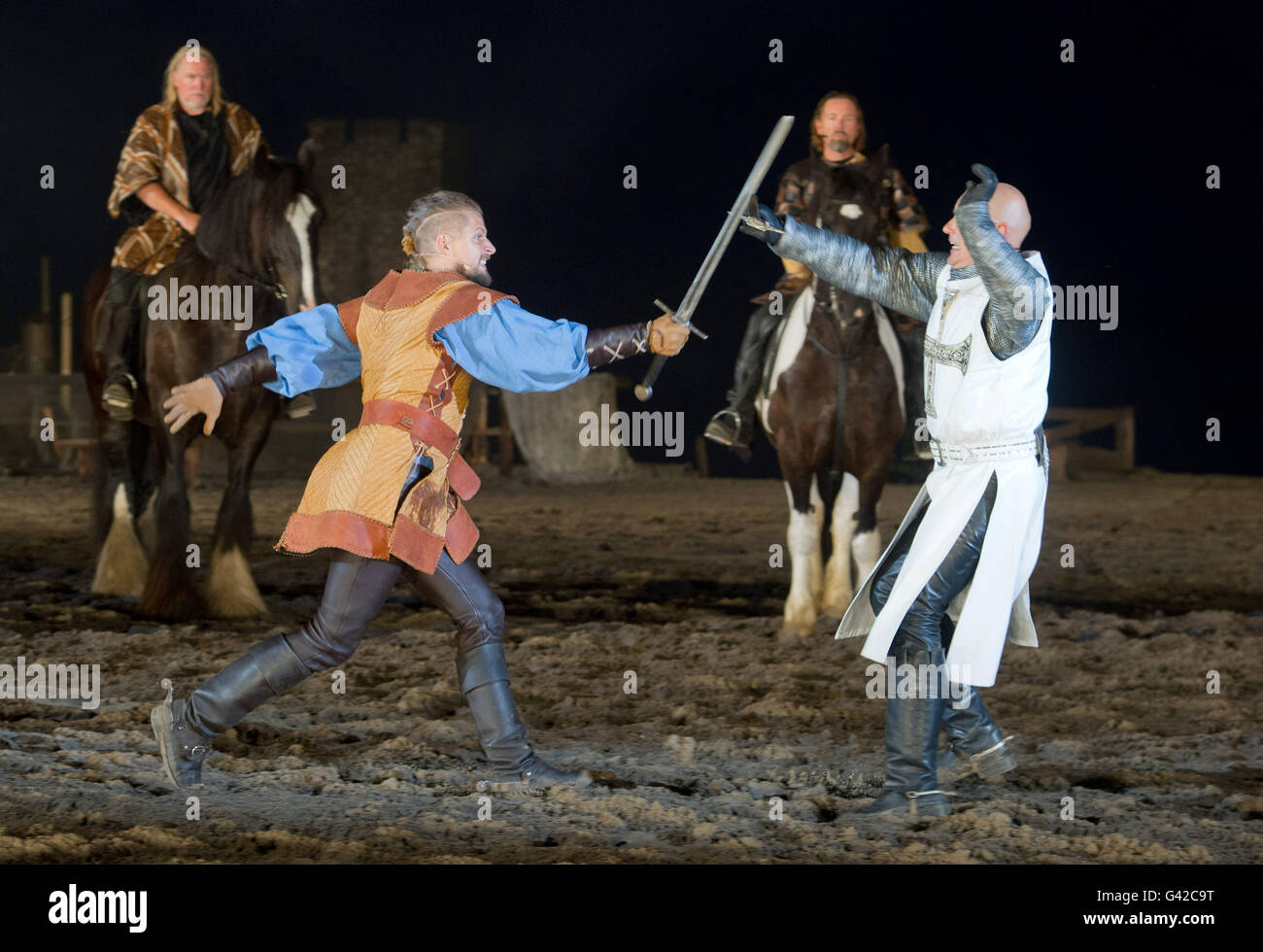 Ralswiek, Germany. 15th June, 2016. Bastian Semm, playing the buccaneer Klaus Stoertebeker, fights Ulrich von Jungingen playing Marco Bahr on stage on the island of Ruegen in Ralswiek, Germany, 15 June 2016. This year's play 'Auf Leben und Tod' begins 18 June 2016. Photo: Stefan Sauer/dpa/Alamy Live News Stock Photo