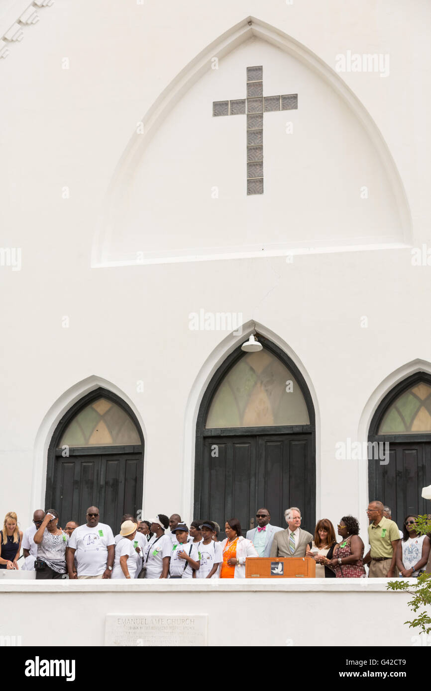 Charleston, United States. 18th June, 2016. Family members of the Charleston Nine stand together for a memorial service on the steps of the Mother Emanuel African Methodist Episcopal Church on the anniversary of the mass shooting June 18, 2016 in Charleston, South Carolina. Nine members of the church community were gunned down during bible study inside the church on June 17, 2015. Credit:  Planetpix/Alamy Live News Stock Photo