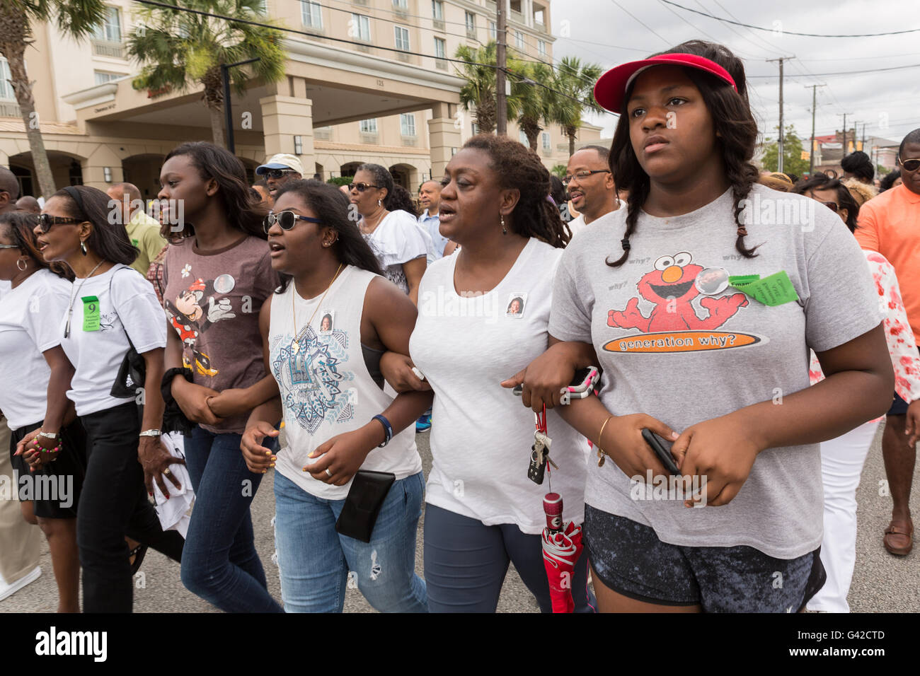 Charleston, United States. 18th June, 2016. Family members of the nine people killed at the Emanuel AME Church hold a march on the anniversary of the mass shooting June 18, 2016 in Charleston, South Carolina. Nine members of the historic Mother Emanuel African Methodist Episcopal Church were gunned down during bible study at the church on June 17, 2015. Credit:  Planetpix/Alamy Live News Stock Photo