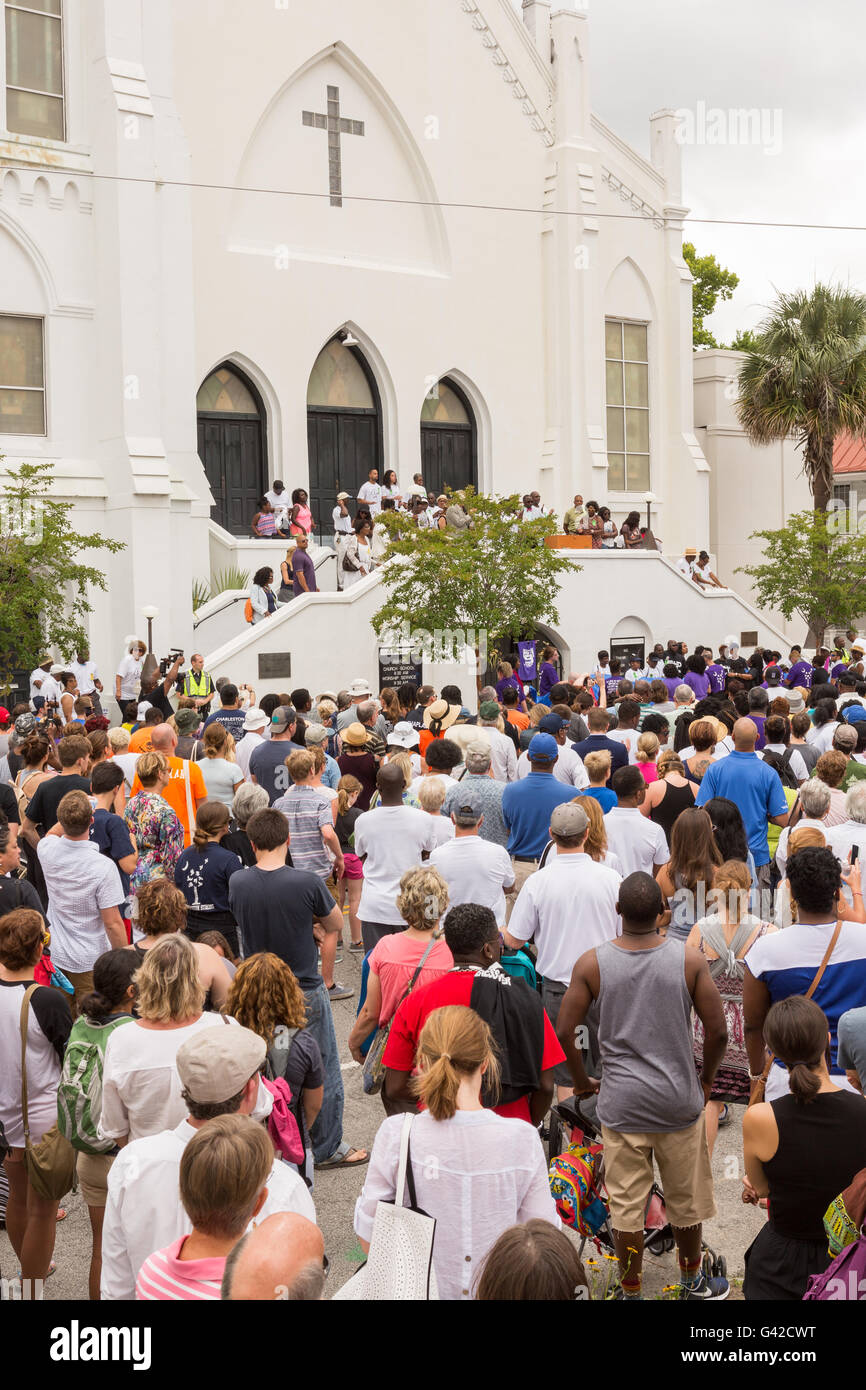 Charleston, United States. 18th June, 2016. Residents gather for a memorial service for the Charleston Nine outside at the Mother Emanuel African Methodist Episcopal Church on the anniversary of the mass shooting June 18, 2016 in Charleston, South Carolina. Nine members of the church community were gunned down during bible study inside the church on June 17, 2015. Credit:  Planetpix/Alamy Live News Stock Photo