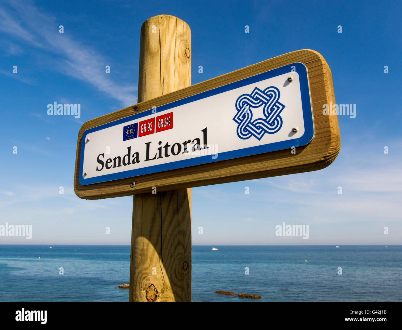 Senda Litoral signal indicative. Pathway wooden walkway path beach, Mijas Malaga province Costa del Sol. Andalusia southern Stock Photo