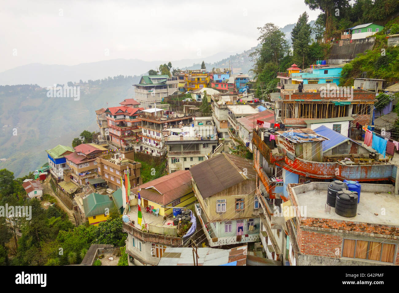 View from Darjeeling Ropeway - Cluster of old houses in the mist in Darjeeling, West Bengal, India Stock Photo