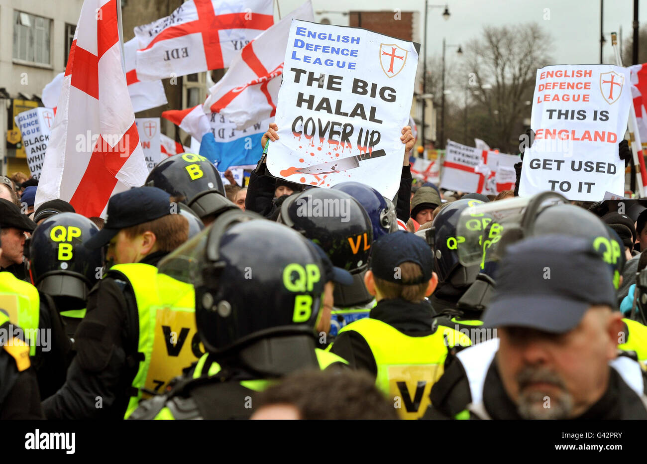 Police watch English Defence League members protesting in St George's ...