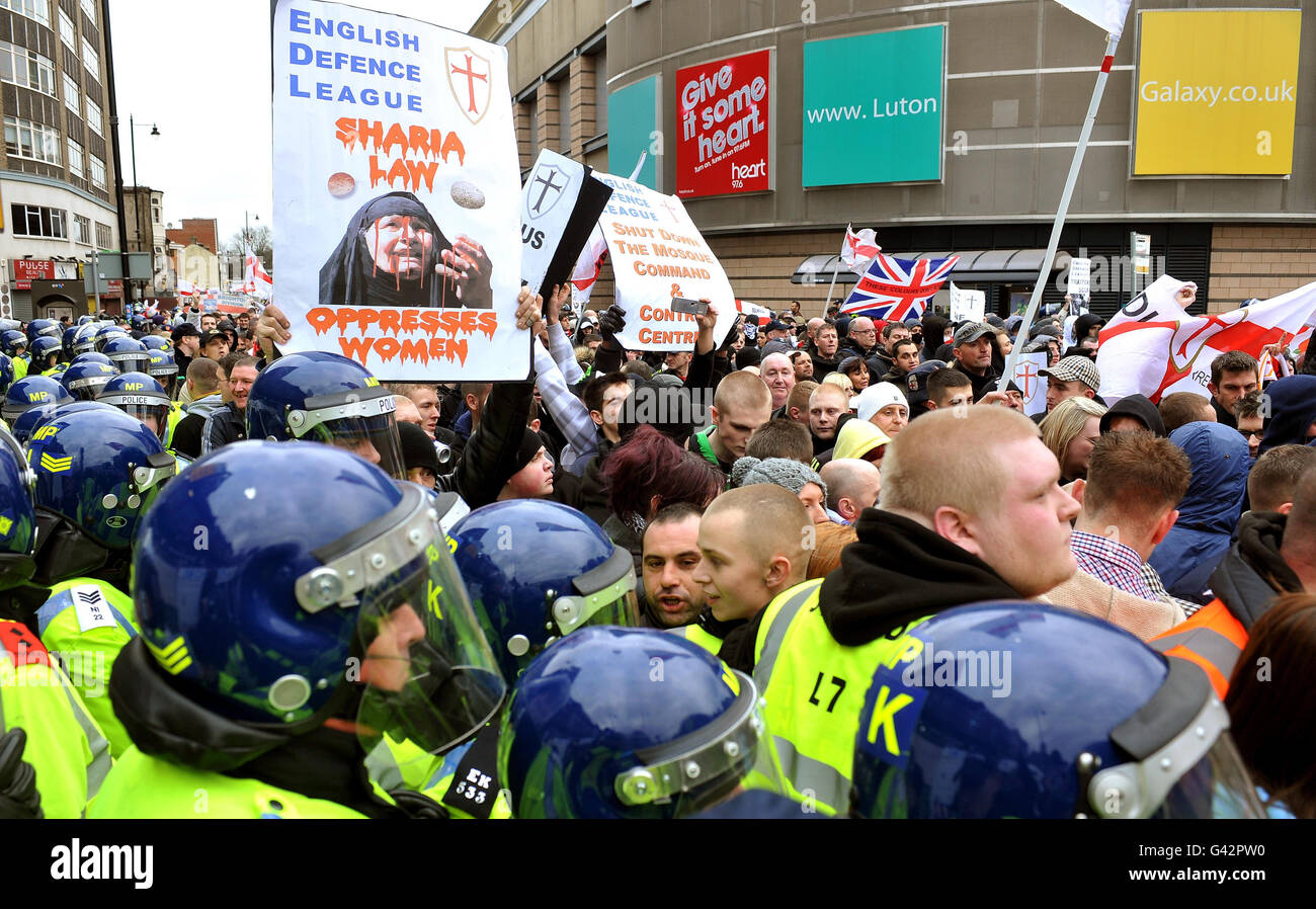 Police watch English Defence League members protesting in St George's ...