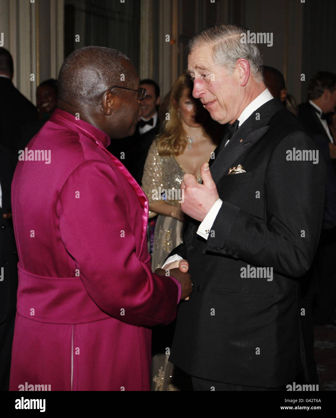 Britain's Prince Charles, the Prince of Wales, meets singer Annie Lennox at  a fund-raising gala dinner supported by representatives from Zimbabwean  charities at Claridge's in central London Tuesday, Feb. 8, 2011. (AP