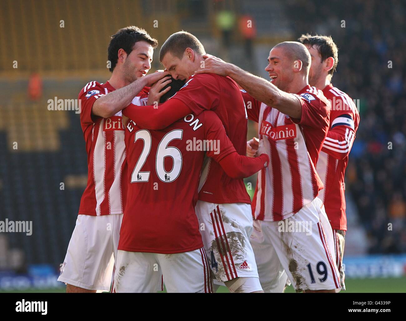 Stoke City's Robert Huth (centre) is congratulated by his team-mates after scoring the first goal of the game Stock Photo