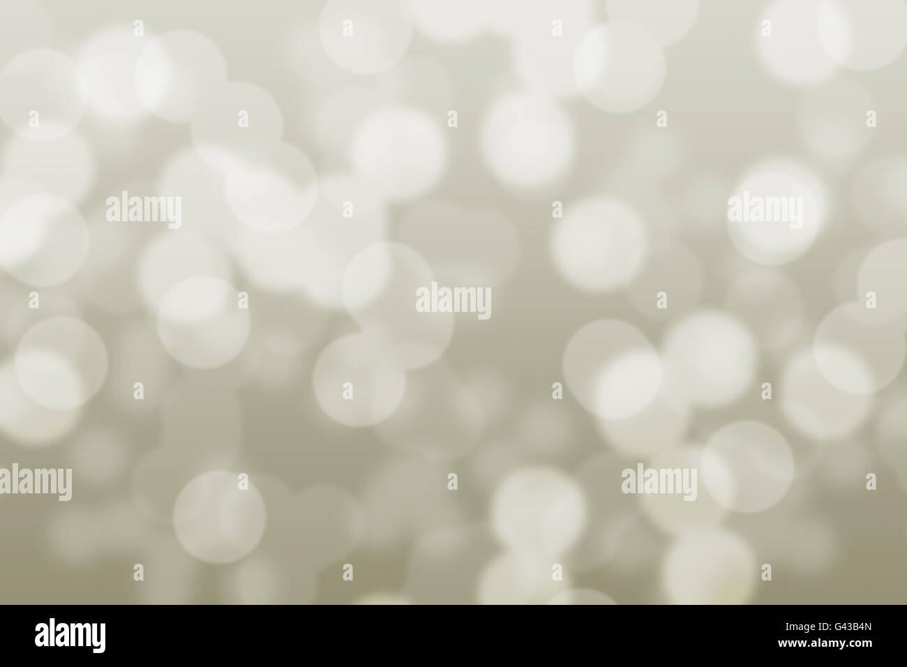 Abstract circular grey brown and white light bokeh background Stock Photo