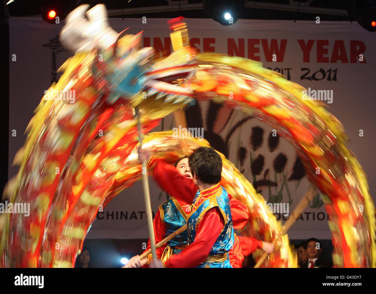 Dancers perform a Chinese dragon dance as part of the Chinese New Year ...