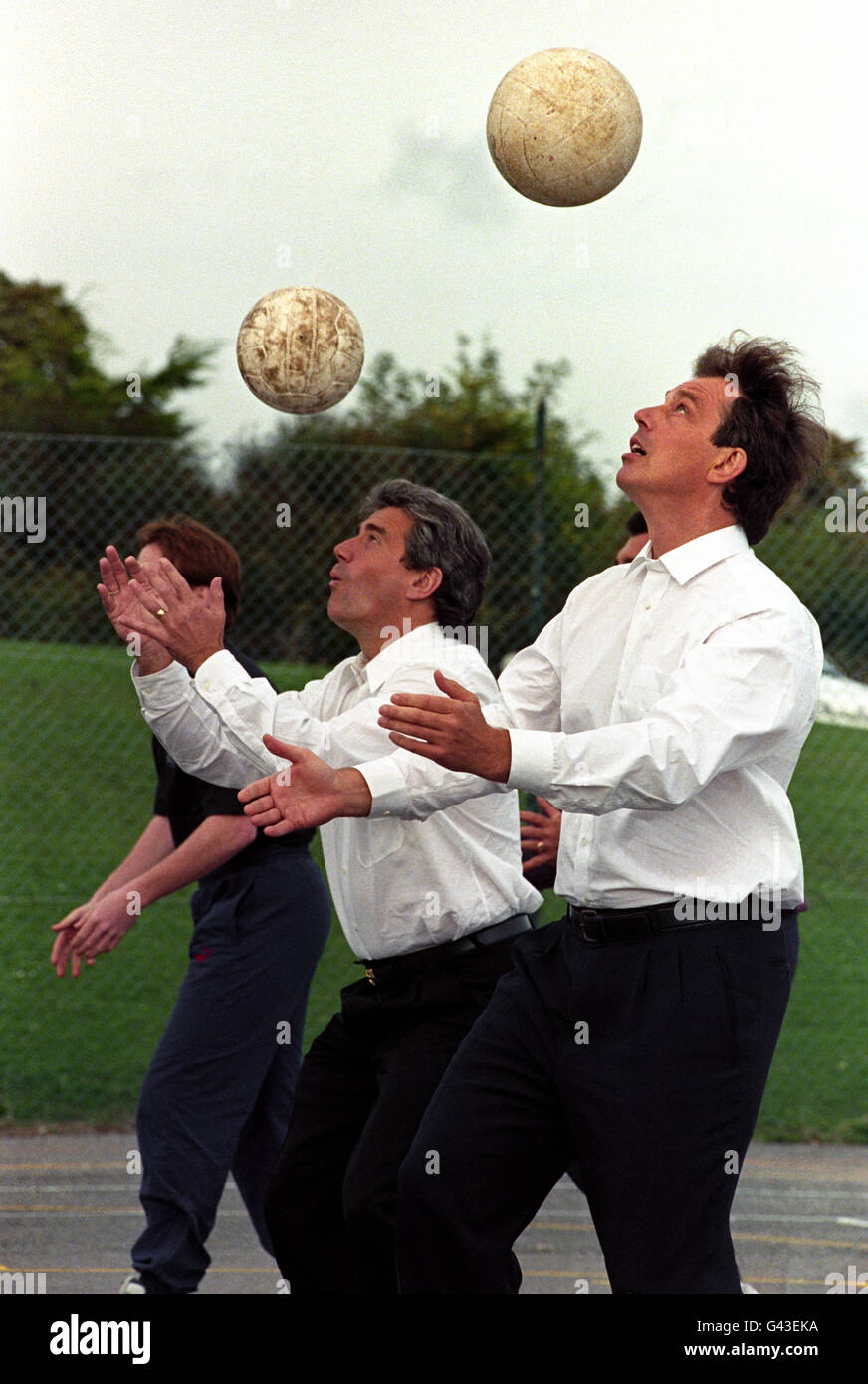 Labour leader Tony Blair (right) takes part in a ball-heading contest with Newcastle United boss Kevin Keegan in Brighton during a break in the party conference. R/I: 8.1.97. Keegan sensationally resigned as manager of Newcastle United. * saying that he no longer wanted to be in football management. * R/I: 17/2/99: The FA announced the appointment of Keegan as temporary England coach for the next four international matches. *19/10/03: Prime Minister Tony Blair was admitted to hospital where he underwent treatment for an irregular heartbeat. The 50-year-old Prime Minister spent almost five Stock Photo