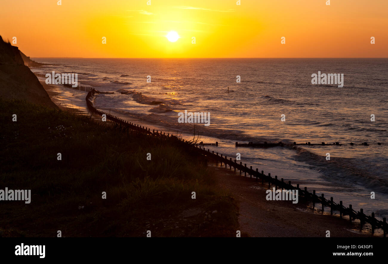 Sunset over the North Sea at West Runton, Norfolk UK Stock Photo