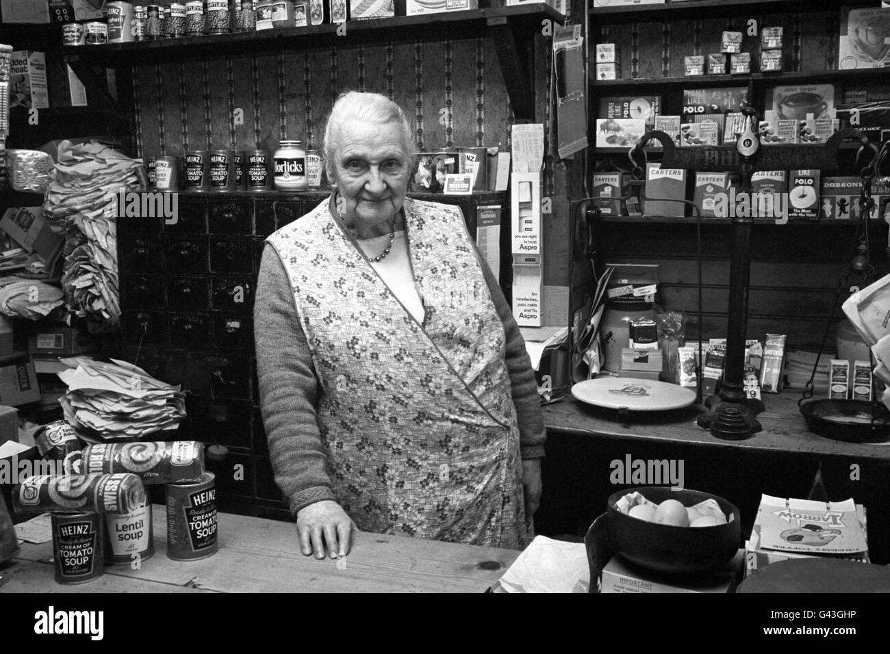 On 13th February 1971, Mrs Alice Robinson, 87, will close the doors of her general store for the first time in 50 years, the reason is decimalisation. 'I can't be bothered with this new money' she said. 'six robberies in five years couldn't close me, but this new money has.' she continued. Alice had no plans to retire until the currency went decimal. 'I know the old system and i'm not going to fiddle about with any new one.' she finished. Decimalisation begins on February 15th 1971. Stock Photo