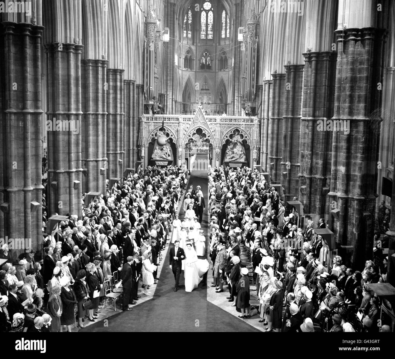 Princess Alexandra and Angus Ogilvy walk down the aisle at Westminster Abbey after their wedding Stock Photo