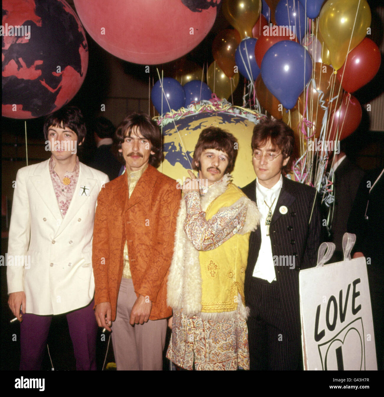 The Beatles at a recording session in London. (l-r) Paul McCartney, George Harrison, Ringo Starr and John Lennon. *12/08/2000 The 20th anniversary of John Lennon's death was being commemorated Friday December 8th, 2000, with a blue plaque unveiled at his suburban childhood home. Lennon lived at the small semi-detached house in Woolton, Liverpool, from the age of five until 1963, when the 23-year-old achieved worldwide fame with the Beatles. * 12/11/2000: The band will unleash an album widely expected to become one of the biggest sellers of all time. With 80 minutes of music on it, the album, Stock Photo