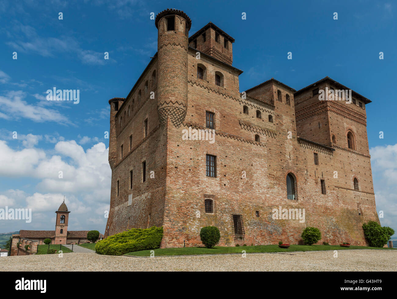 Grinzane Cavour, Italy - May 30, 2016: Wine Castle Grinzane Cavour and Church in  Piedmont in Barolo district in Italy. Stock Photo