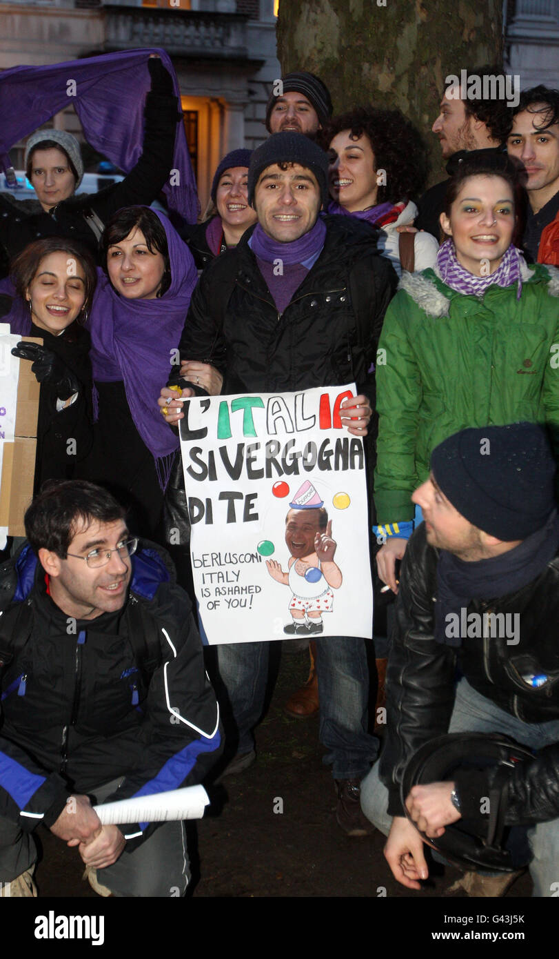 Protesters outside the Italian Embassy in London show solidarity with thousands of women in Italy demonstrating against Premier Silvio Berlusconi. Stock Photo