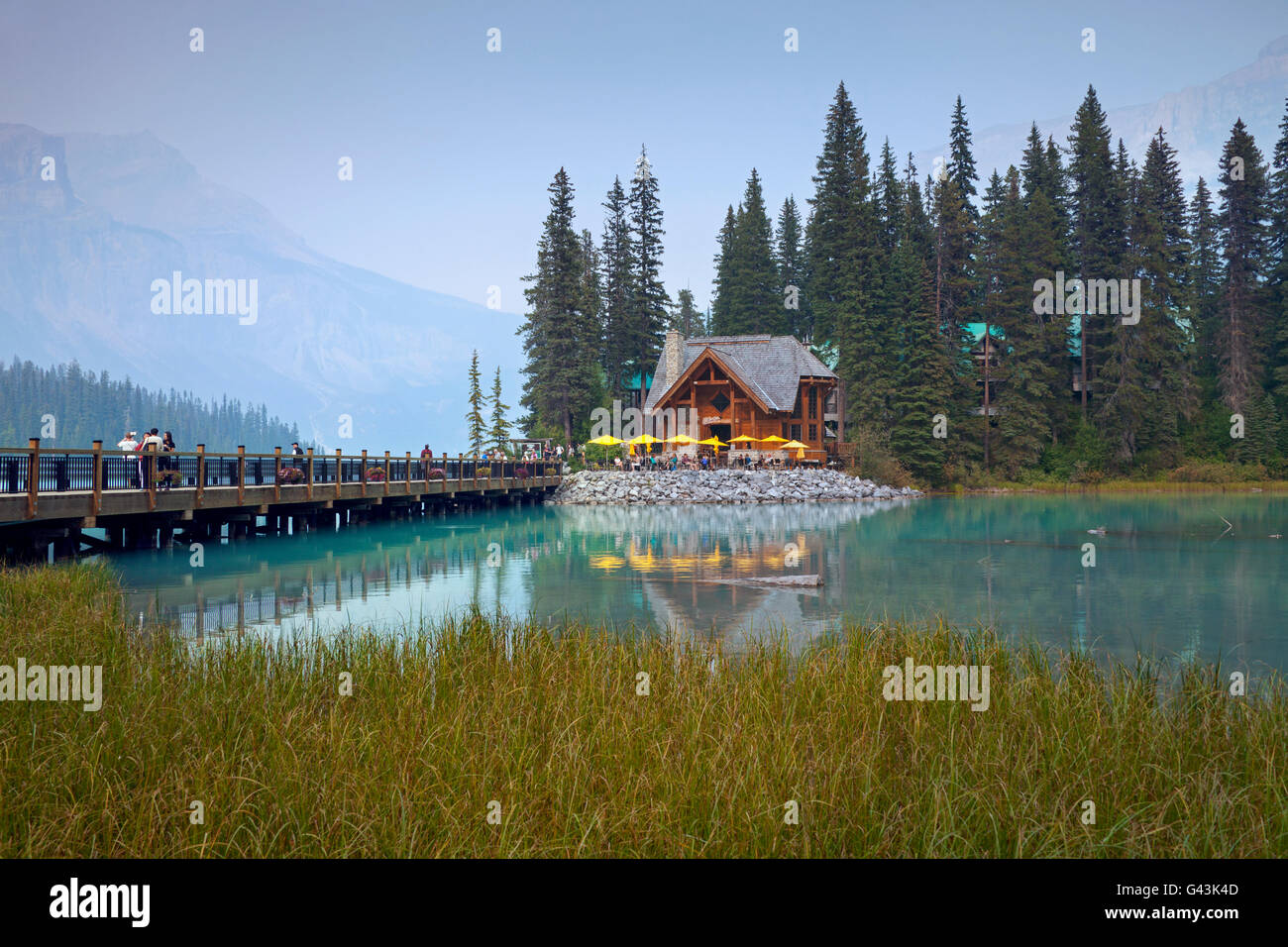 Tourists at Emerald Lake Lodge, conference centre along Emerald Lake, Yoho National Park, British Columbia, Canada Stock Photo