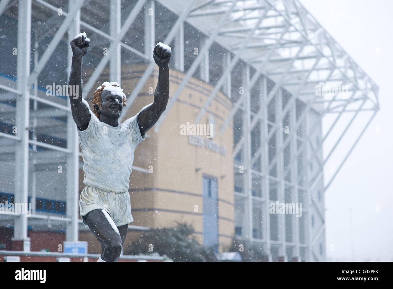 The Billy Bremner statue outside Elland Road stadium is covered in snow