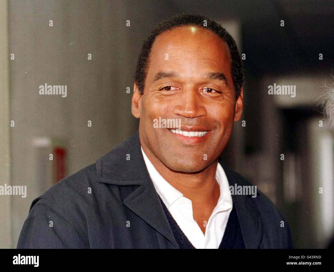 3rd OCTOBER:On this day in 1995 OJ Simpson is Aquitted of killing Nicole Brown. OJ Simpson arrives at Heathrow airport on the first day of his visit to London. Stock Photo