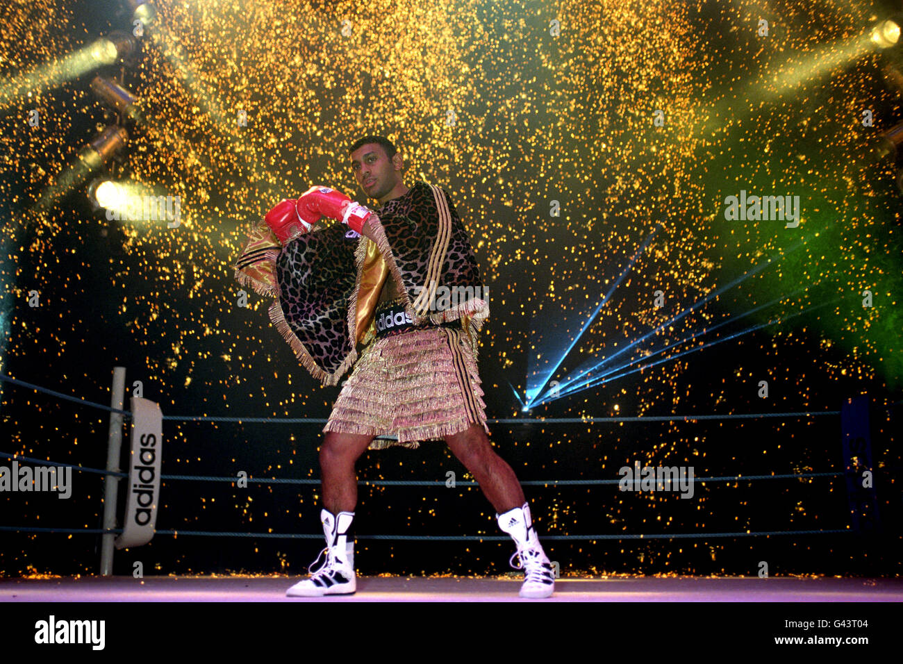 Featherweight boxer Prince Naseem Hamed launching his new Adidas  sponsorship deal in his usual flamboyant style in Brixton, south west  London. Under a ten-fight sponsorship contract, the WBO Featherweight  Champion of the