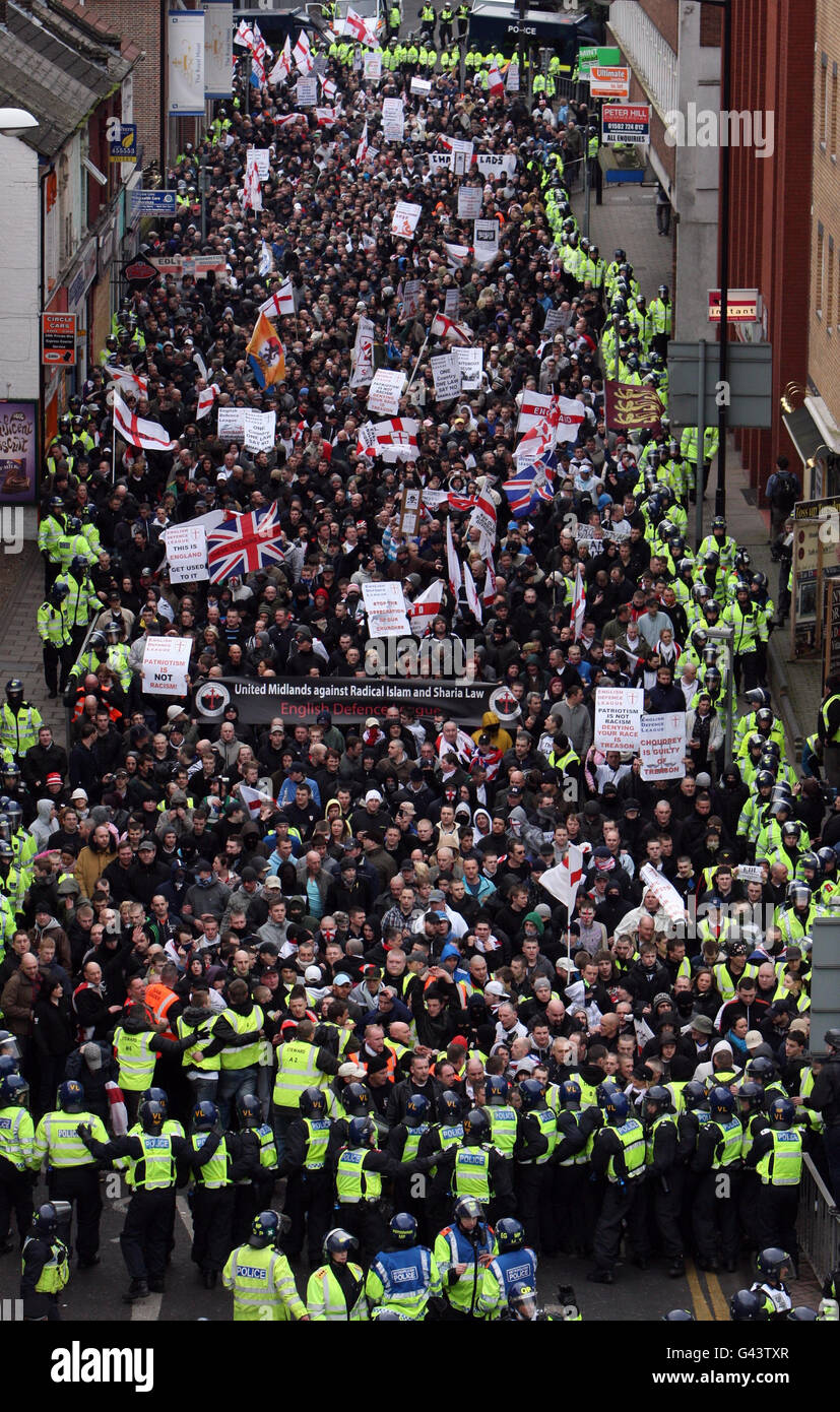 A large group of English Defence League members march through Luton ...