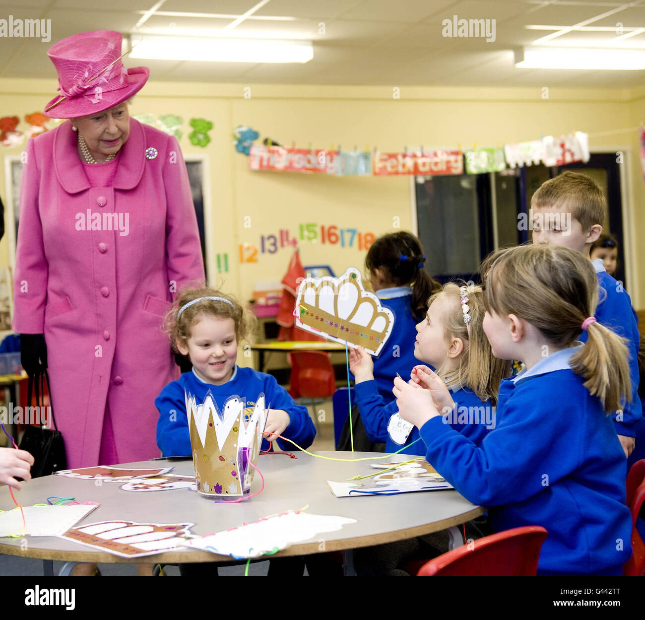 The Queen meets pupils at King's Court First School, in Old Windsor, Berkshire, on the occasion of its 50th anniversary. Stock Photo