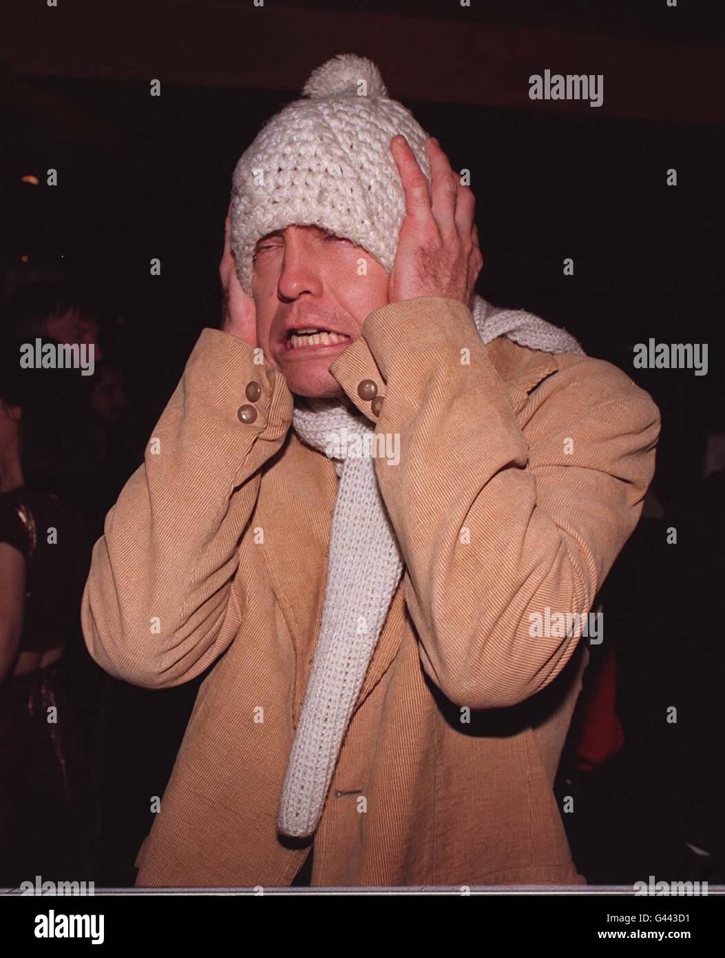 Actor/singer Jason Donovan clowns around at a charity 'Jokeathon', held at Bill Wyman's Sticky Fingers restaurant, in aid of the Daniels Charitable Trust, which was set up in the name of Batten's Disease sufferer four-year-old Rhys Daniels. Stock Photo