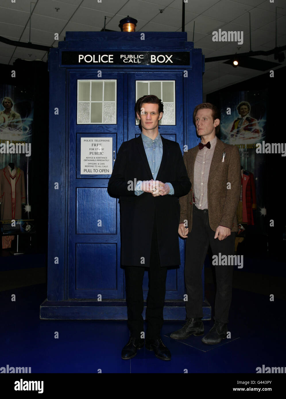 Matt Smith (left) poses next to the Tardis and a life size scale model of  Doctor Who, during the VIP launch of Doctor Who Experience at Olympia Two  in Kensington, west London