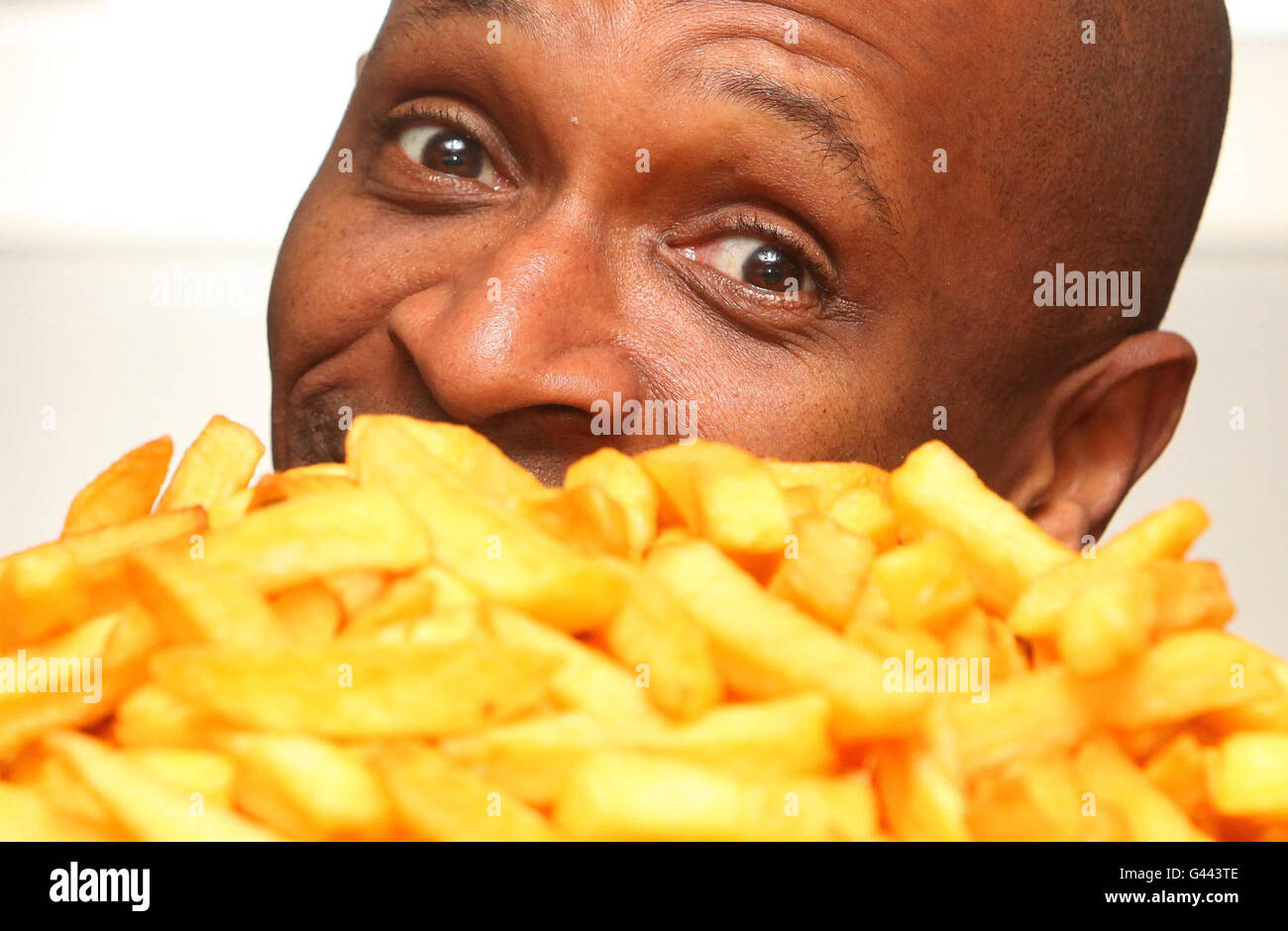 Andy Abraham, X-Factor's 'singing dustman' helps launch, Chip Factor' as part of National Chip Week 2011. Stock Photo