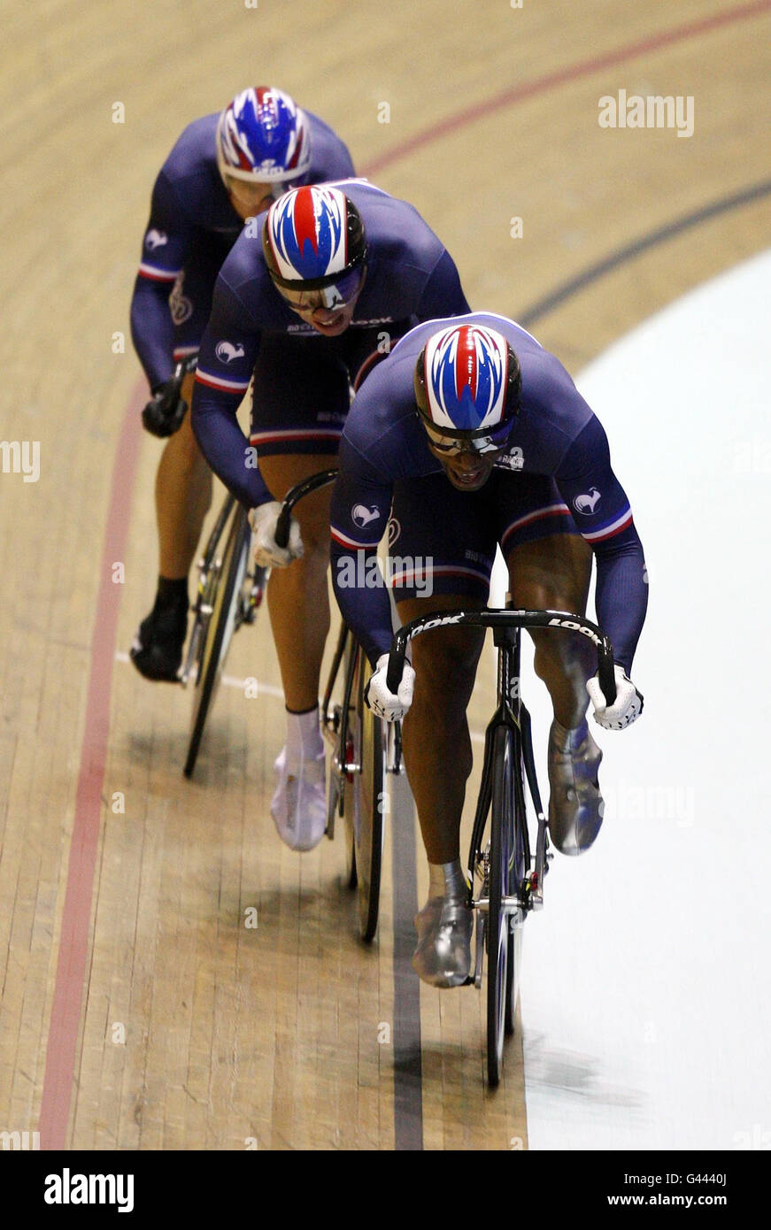 French Men's Team Sprinter Gregory Bauge, Michael D'Almeida and Kevin Sireau in Qualifying during the Track World Cup at the National Cycling Centre, Manchester. Stock Photo