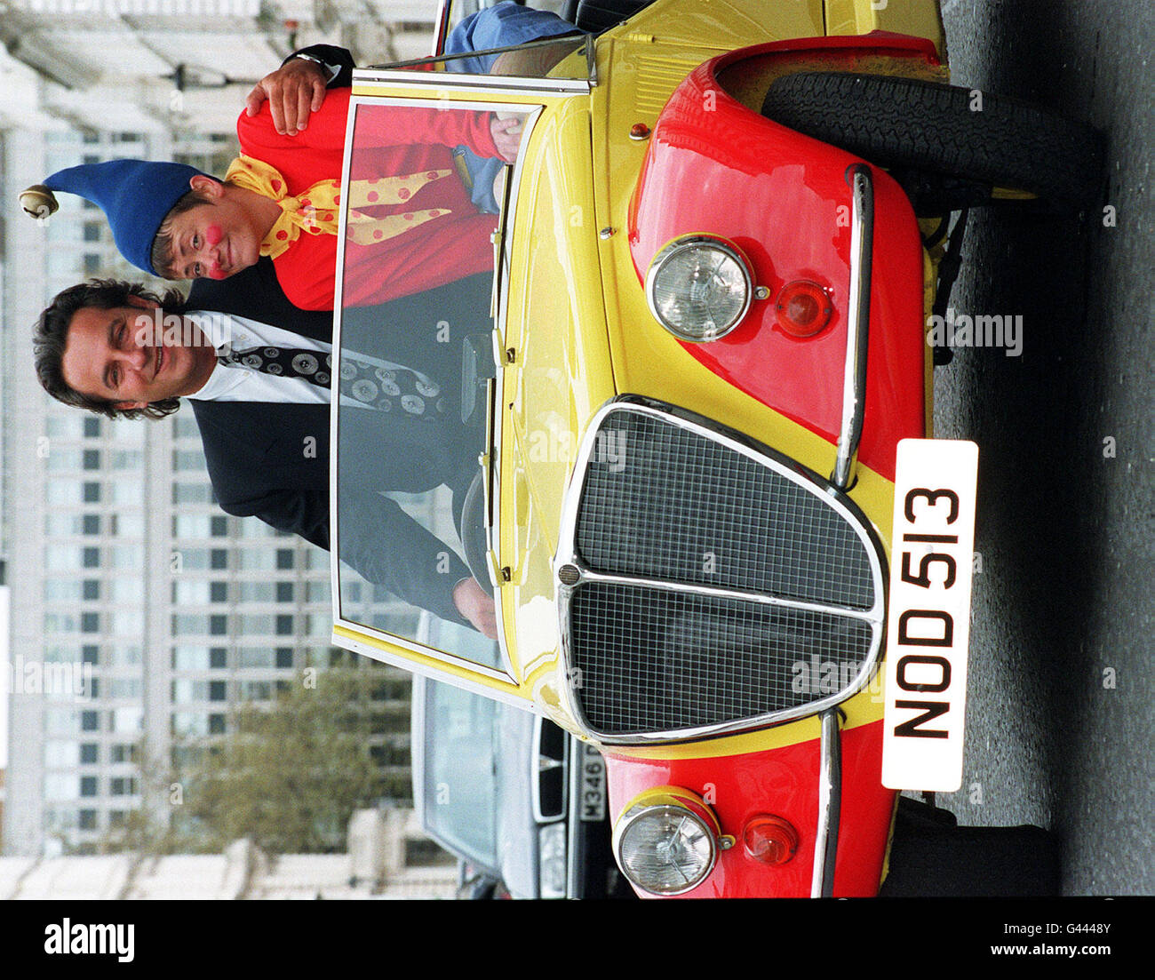 Chief executive officer of Tracadero plc, Nick Leslau, poses with 'Noddy' at a photocall in London where it was announced that the Enid Blyton Company, a subsidiary of Trocadero plc, and BBC Worldwide Ltd had reached agreement on a new partnership for the marketing of Noddy, one of Blyton's best known characters. Stock Photo