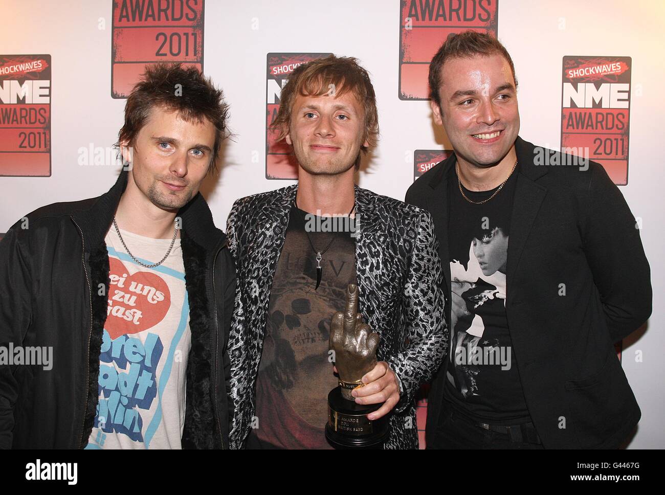 Muse with the Hottest Man award, awarded to Matt Bellamy (left) during the 2011 NME Awards at the O2 Academy, Brixton, London Stock Photo