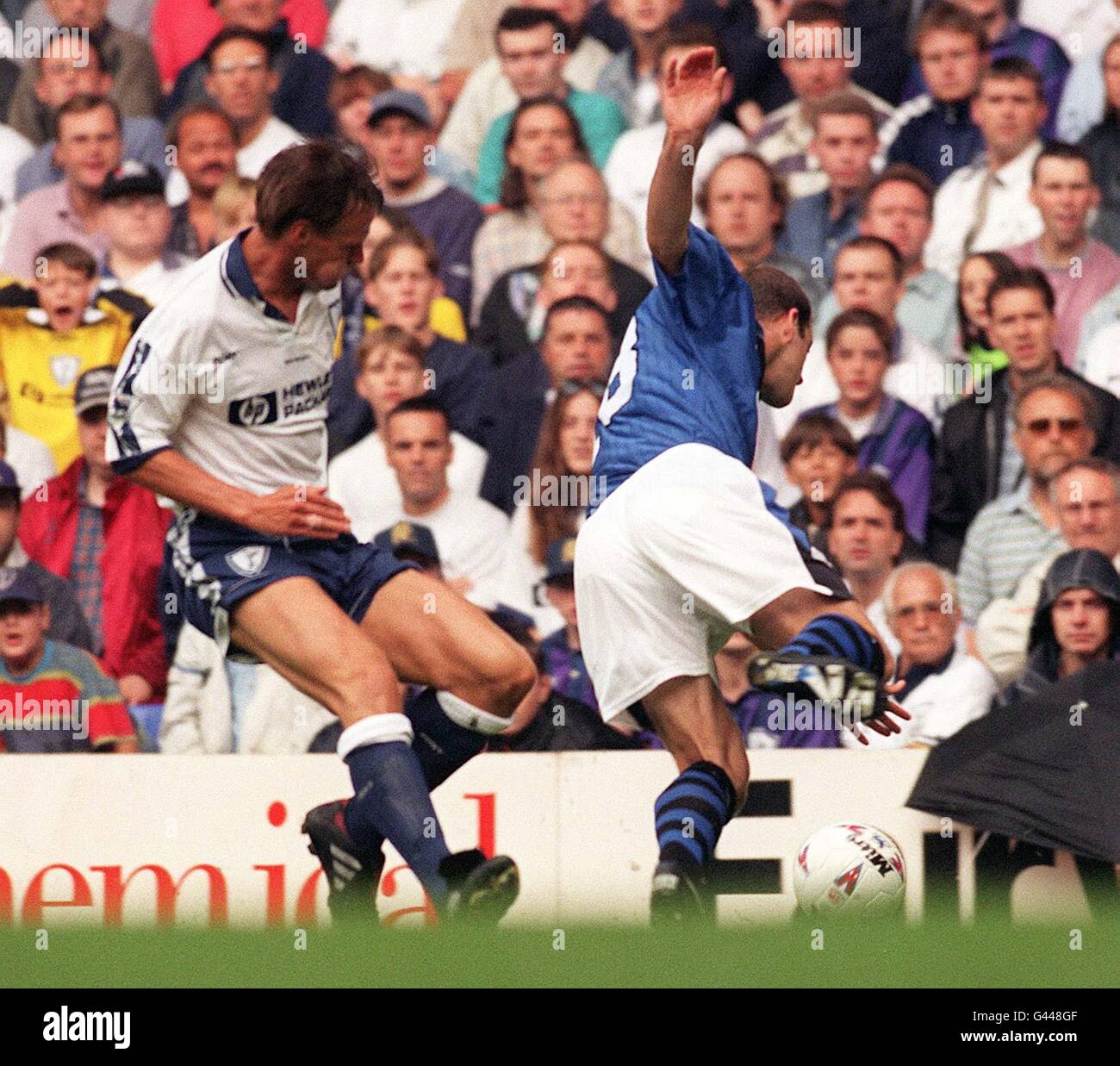 Spurs' Teddy Sheringham closes in on Joe Parkinson during today's