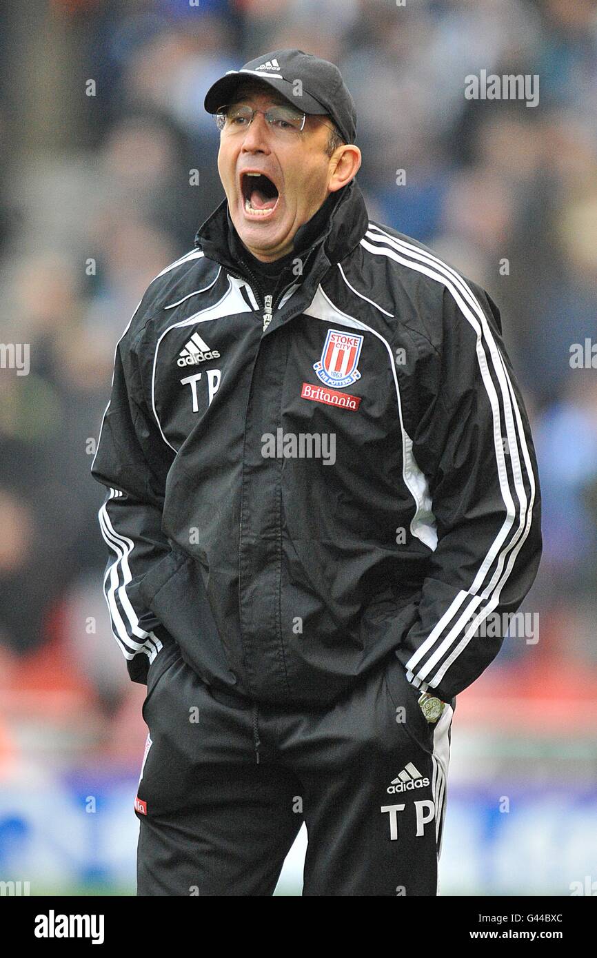 Stoke City manager Tony Pulis shouts on the touchline Stock Photo - Alamy