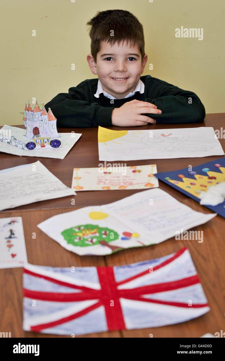 Jolyon Ellis, aged six, with some hand made invitations addressed to Prince William and Miss Catherine Middleton, requesting their attendance for Bucklebury C of E Primary School's garden party in Newbury. Stock Photo