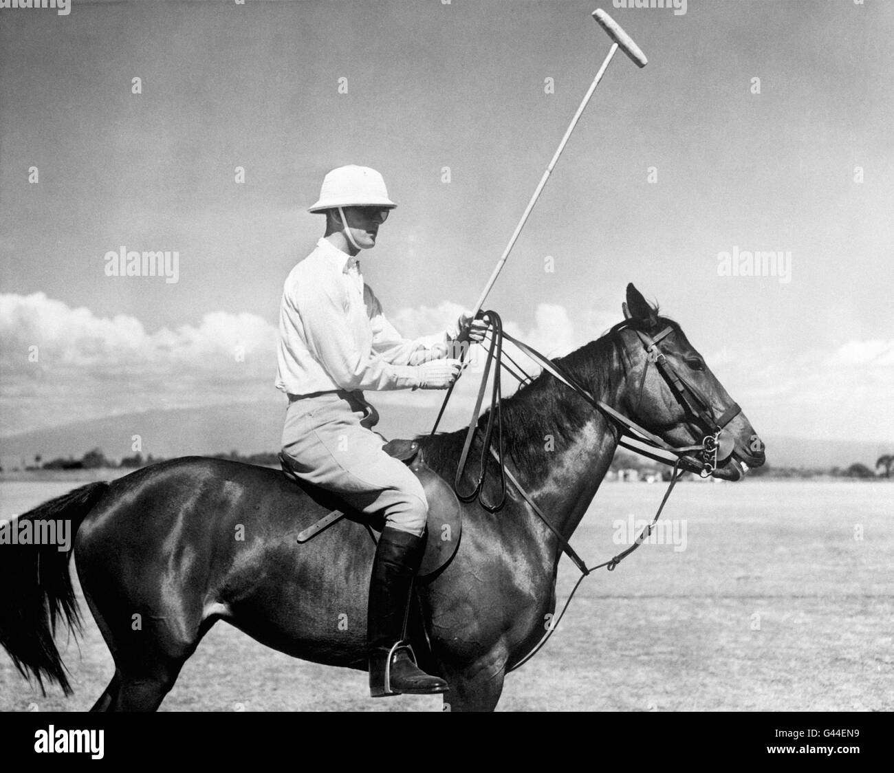 Prince Philip, the Duke of Edinburgh, taking part in a Polo match at the Nyeri Polo Club, Kenya, whilst accompanying Princess Elizabeth on a Royal Tour of the Commonwealth. Stock Photo