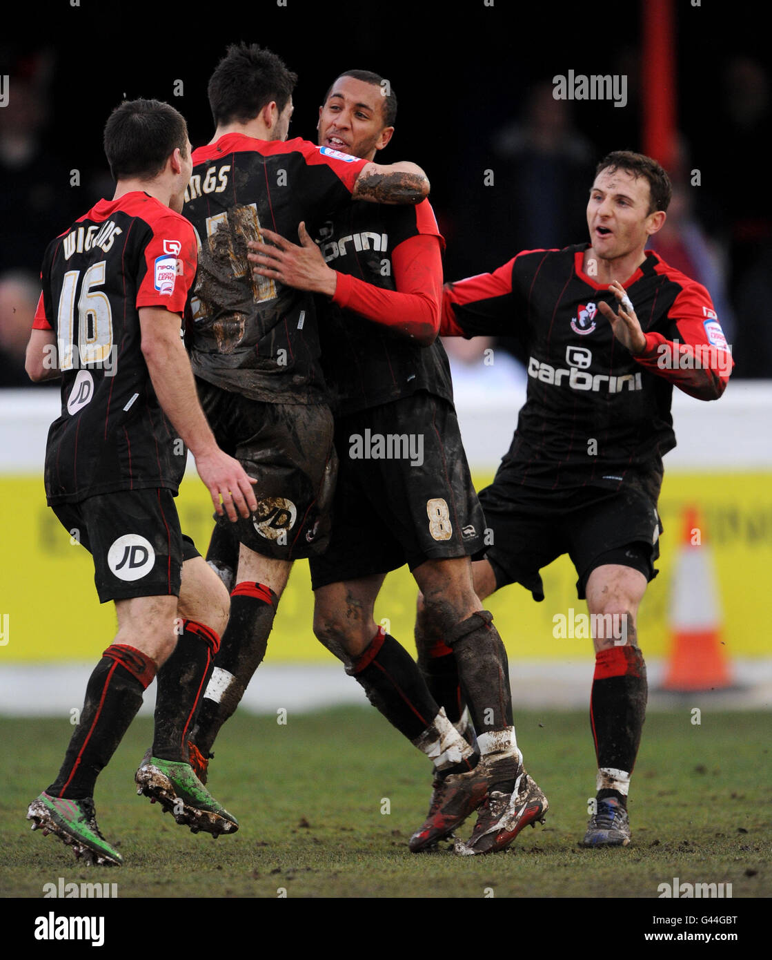 AFC Bournemouth's Anton Robinson (2nd from right) celebrates his winning goal during the npower football League One match at Victoria Road, London. Stock Photo