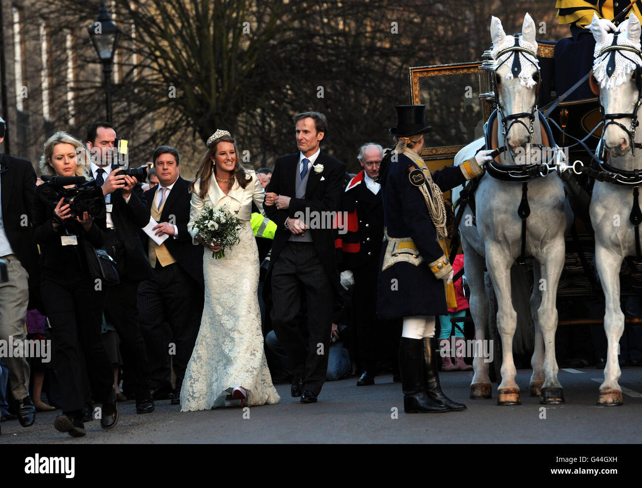 Lady Katie Percy arrives with the Duke of Northumberland for her wedding to Patrick Valentine at St Michaels Church, Alnwick, Northumberland. Stock Photo