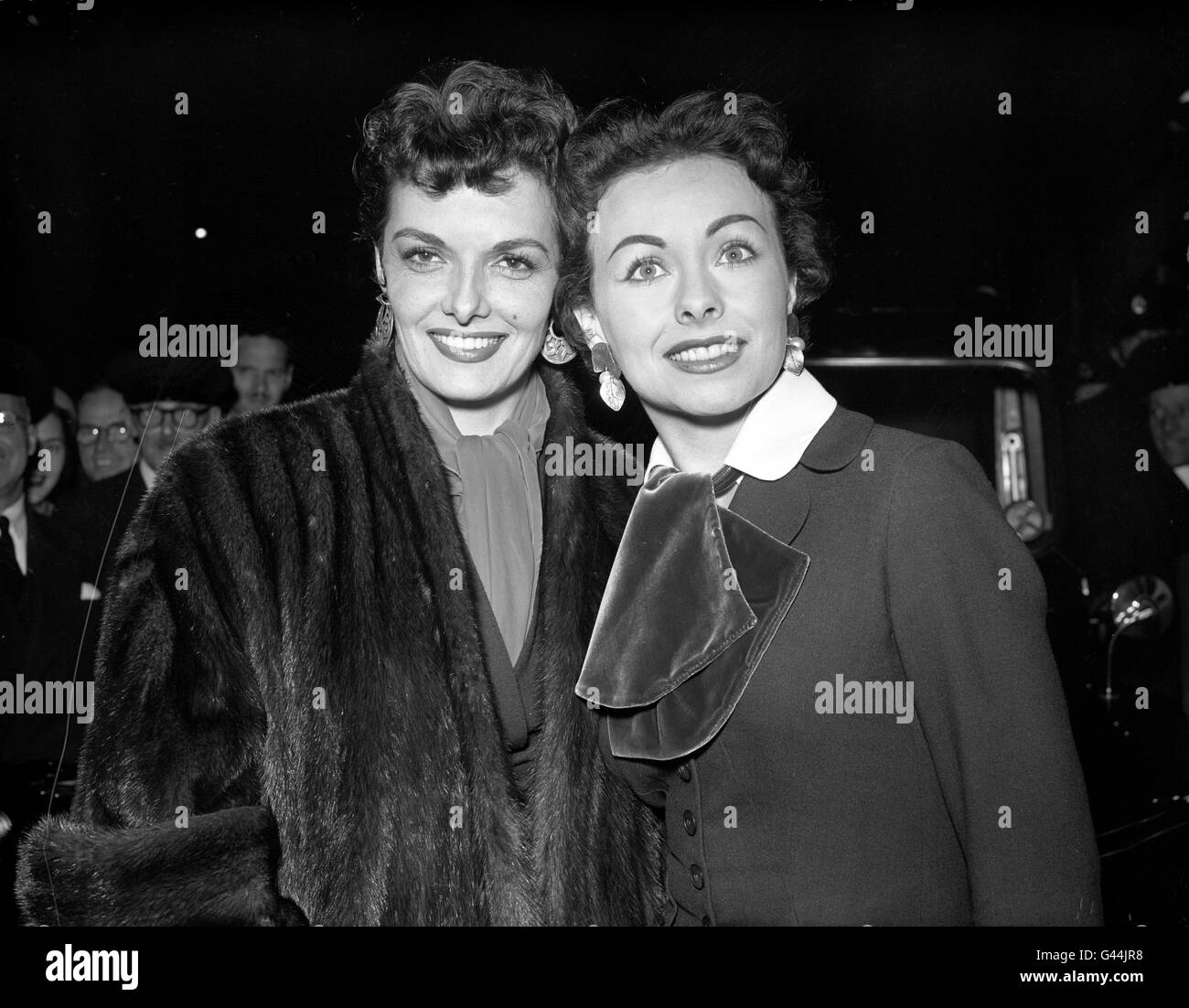 American actress's Jane Russell (left) and Jeanne Crain during a reception at the Dorchester Hotel, London. They have just come to London from Paris for further work on the film 'Gentlemen Marry Brunettes'. Stock Photo
