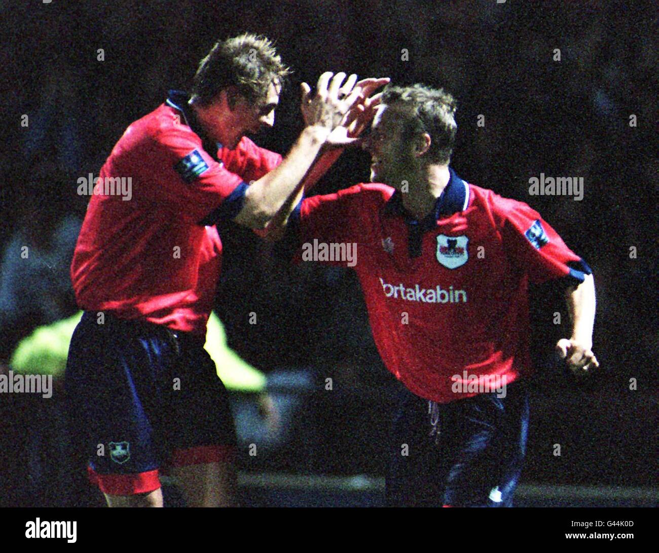 Gary Bull (left), the scorer of York City's second goal, celebrates ...