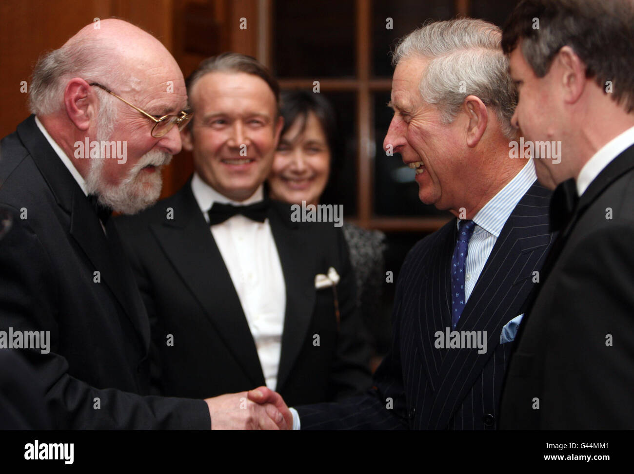 The Prince of Wales (right) is greeted by Prebendary Adrian Benjamin ...