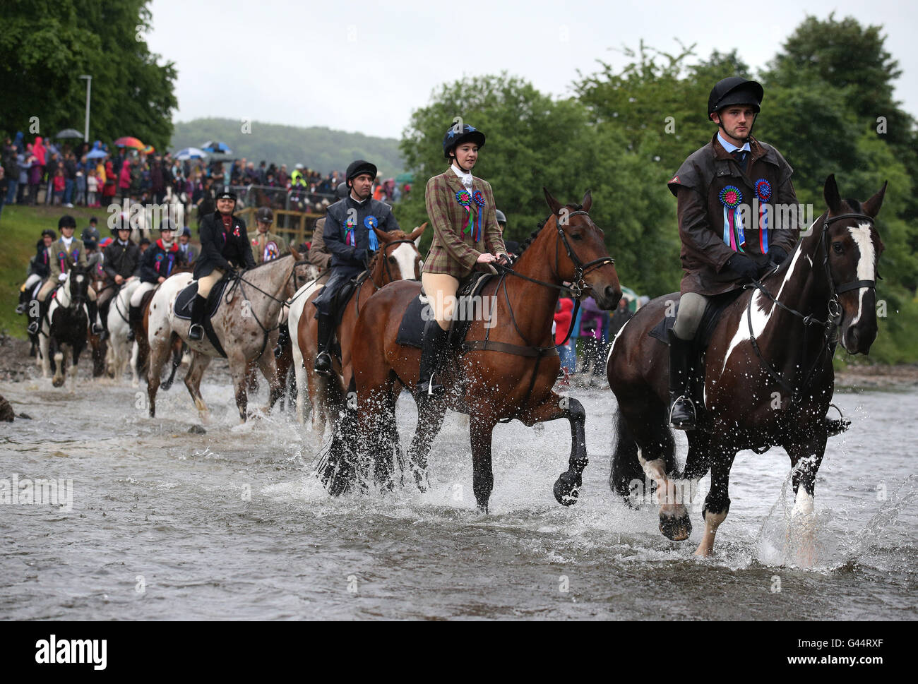 Riders cross a ford on the River Ettrick as they take part in the ...